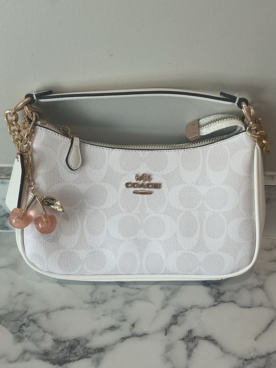 Coach Handbags - Coach White Teri Signature Canvas Shoulder Bag with Cherry Charm Accent